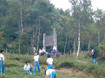 ���}����